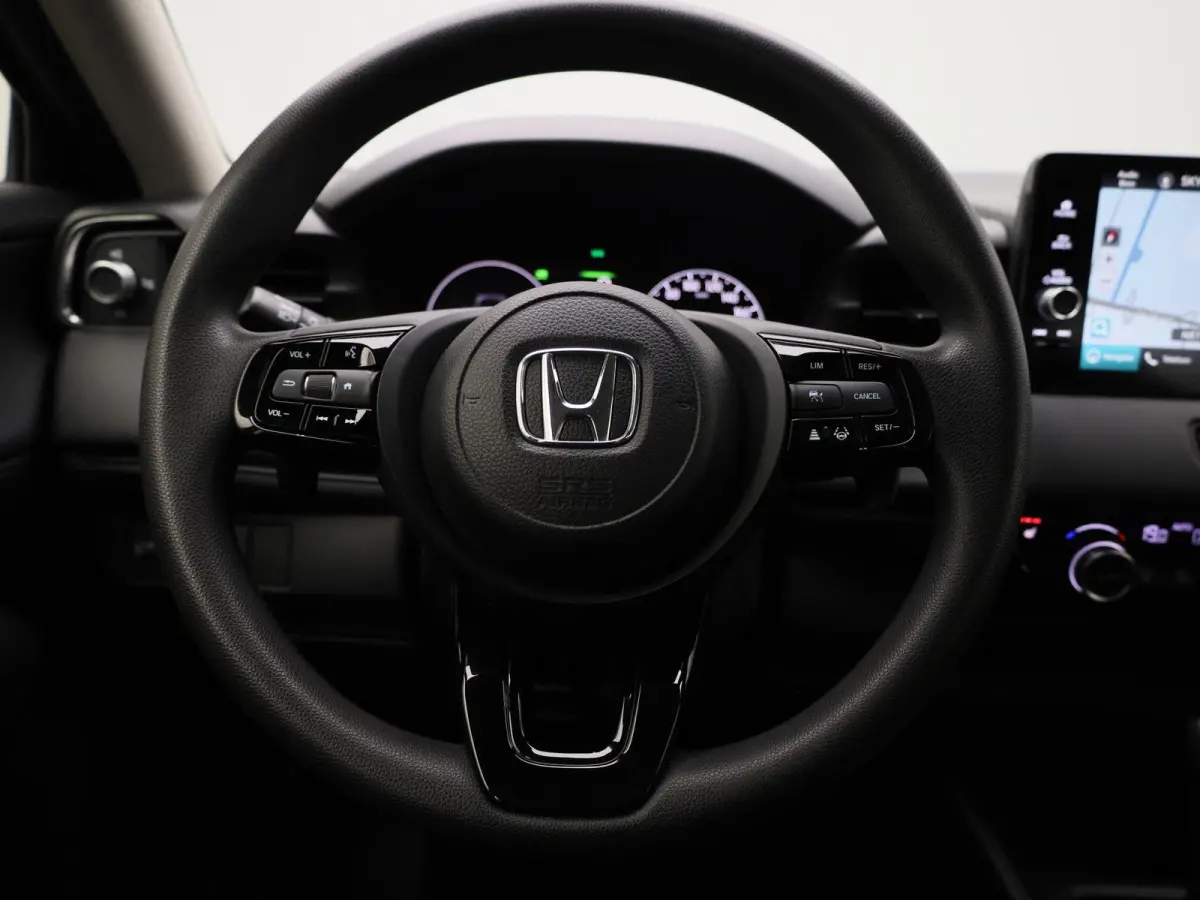 1.5 e:HEV Elegance | ACHTERUITRIJCAMERA | NAVIGATIE | BLUETOOTH | CRUISE CONTRL | LED VERLICHTING | LICHTMETALEN VELGEN | DAB RADIO | RIJSTROOKHULP | DIGITAL COCKPIT \