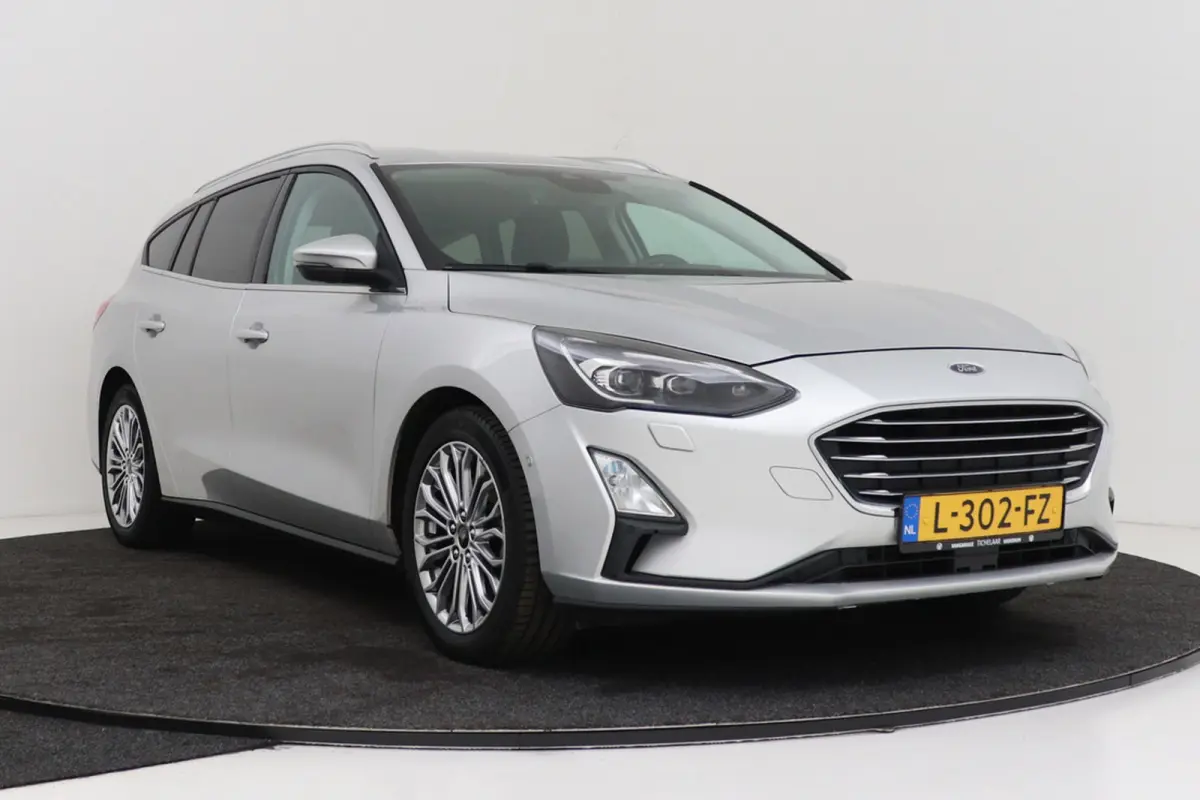 1.0 EcoBoost Titanium | Trekhaak | Adap. Cruise | Camera | CarPlay | LED | Winter Pack |