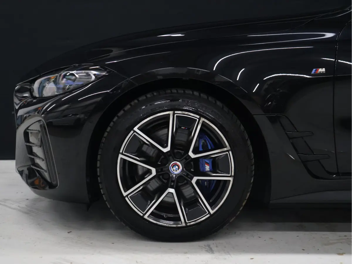M50 High Executive 84 kWh [SCHUIFKANTELDAK, HARMAN/KARDON, APPLE CARPLAY, ANDROID, CRUISE CONTROL, STOELVERWARMING, MEMORY SEATS, HEAD UP DISPLAY,  DIGITAL DASH, CAMERA, PDC 360, LEDER, SFEE