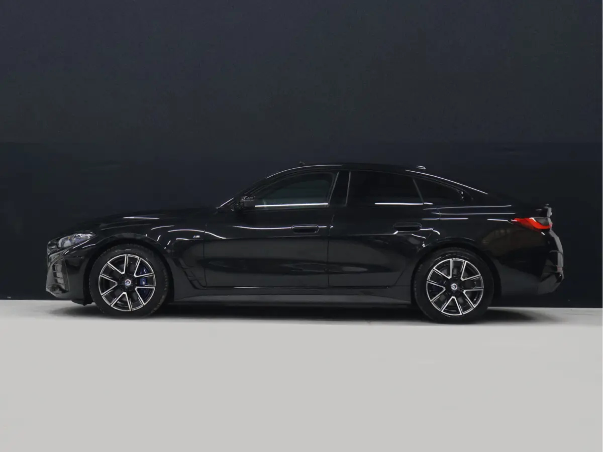 M50 High Executive 84 kWh [SCHUIFKANTELDAK, HARMAN/KARDON, APPLE CARPLAY, ANDROID, CRUISE CONTROL, STOELVERWARMING, MEMORY SEATS, HEAD UP DISPLAY,  DIGITAL DASH, CAMERA, PDC 360, LEDER, SFEE
