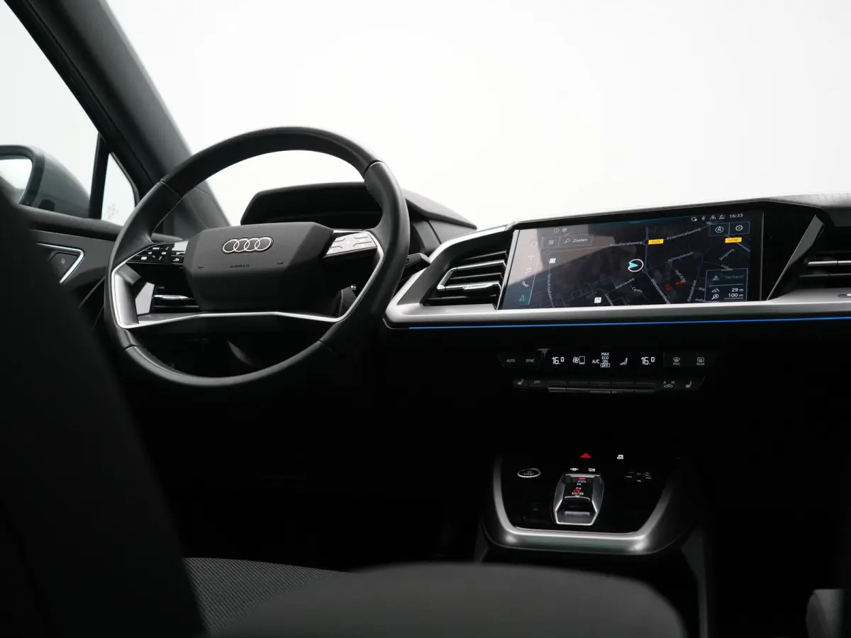 40 Advanced edition 77 kWh 204pk Dealer O.H | SOH 96.6% | Panodak | Adaptive Cruise | Matrix LED | Camera | Sportstoelen Verwarmd | Blis | Sfeerverlichting | Apple Carplay | DAB | Navigatie 