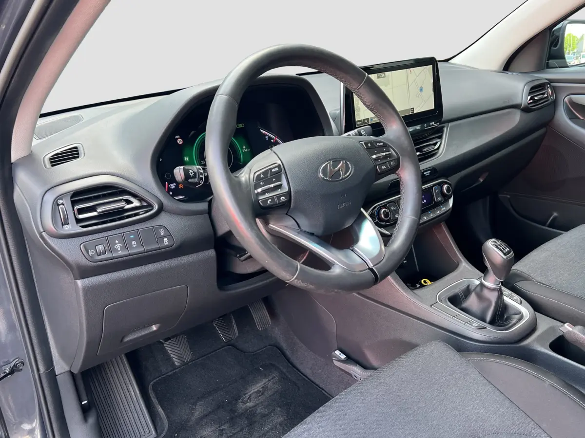 1.0 T-GDi 120pk MHEV Comfort Smart | Camera | Climate controle | Carplay | Cruise controle | Draadloos laden | Keyless entry | LED verlichting | Navigatie | Lichtmetalen velgen | Inklapbare 
