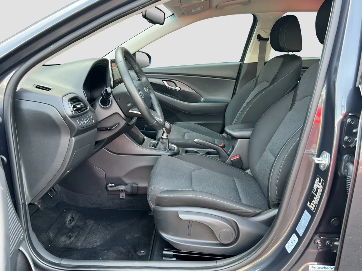 1.0 T-GDi 120pk MHEV Comfort Smart | Camera | Climate controle | Carplay | Cruise controle | Draadloos laden | Keyless entry | LED verlichting | Navigatie | Lichtmetalen velgen | Inklapbare 