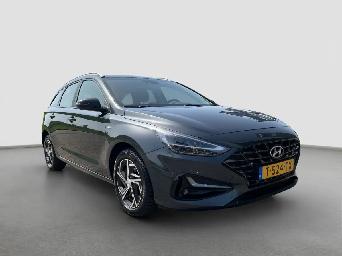 1.0 T-GDi 120pk MHEV Comfort Smart | Camera | Climate controle | Carplay | Cruise controle | Draadloos laden | Keyless entry | LED verlichting | Navigatie | Lichtmetalen velgen | Inklapbare 