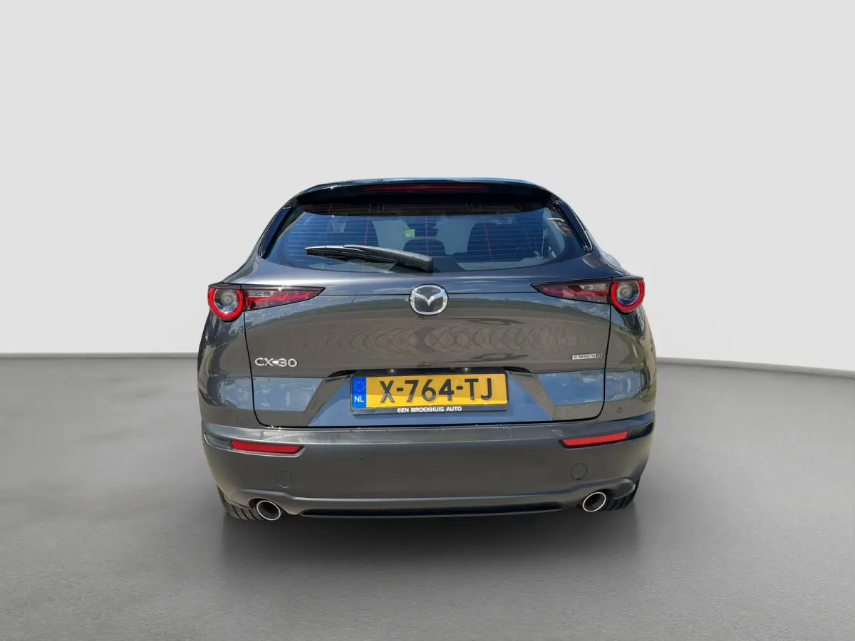 2.0 186pk e-SkyActiv-X M Hybrid Exclusive-line | Camera | Adaptive cruise controle | Carplay | Dodehoek detectie | Climate controle | Draadloos laden | Keyless entry | Parkeersensoren voor e