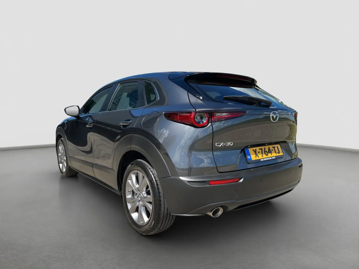 2.0 186pk e-SkyActiv-X M Hybrid Exclusive-line | Camera | Adaptive cruise controle | Carplay | Dodehoek detectie | Climate controle | Draadloos laden | Keyless entry | Parkeersensoren voor e