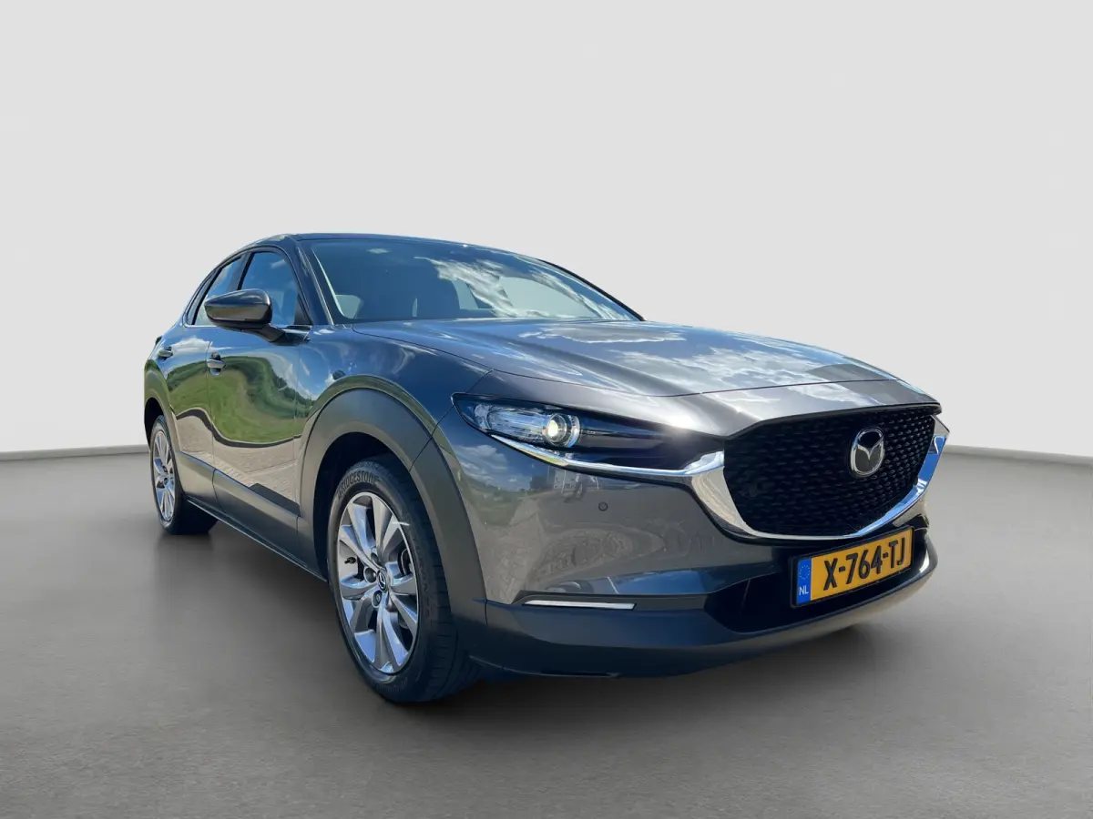 2.0 186pk e-SkyActiv-X M Hybrid Exclusive-line | Camera | Adaptive cruise controle | Carplay | Dodehoek detectie | Climate controle | Draadloos laden | Keyless entry | Parkeersensoren voor e