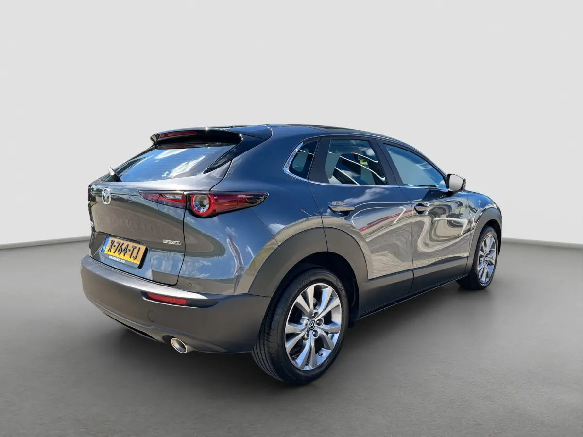 2.0 186pk e-SkyActiv-X M Hybrid Exclusive-line | Camera | Adaptive cruise controle | Carplay | Dodehoek detectie | Climate controle | Draadloos laden | Keyless entry | Parkeersensoren voor e