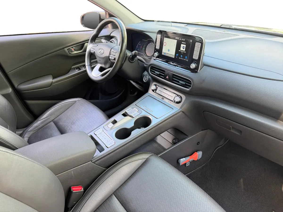 EV Premium 64 kWh HEAD UP DISPLAY | LEDEREN BEKLEDING | 455 KM ACTIERADIUS | ACC | DODEN HOEK DETECTIE | 12 MAANDEN BOVAG GARANTIE