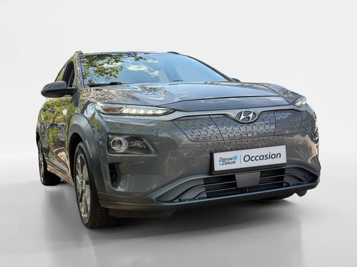 EV Premium 64 kWh HEAD UP DISPLAY | LEDEREN BEKLEDING | 455 KM ACTIERADIUS | ACC | DODEN HOEK DETECTIE | 12 MAANDEN BOVAG GARANTIE