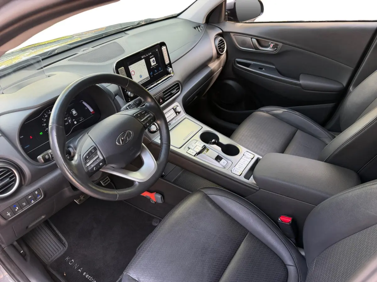 EV Premium 64 kWh HEAD UP DISPLAY | LEDEREN BEKLEDING | 455 KM ACTIERADIUS | ACC | DODEN HOEK DETECTIE | 12 MAANDEN BOVAG GARANTIE