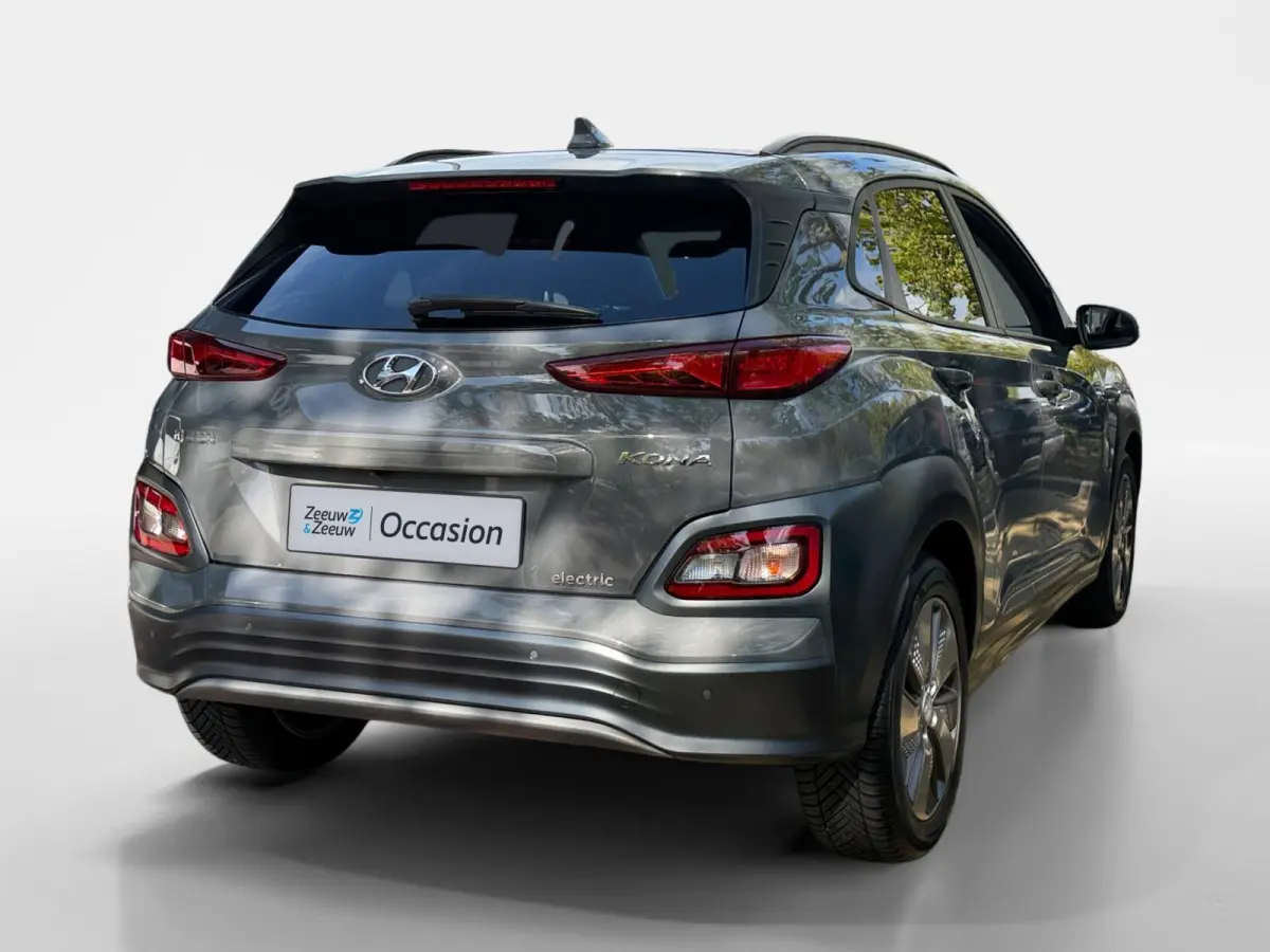 EV Premium 64 kWh HEAD UP DISPLAY | LEDEREN BEKLEDING | 455 KM ACTIERADIUS | ACC | DODEN HOEK DETECTIE | 12 MAANDEN BOVAG GARANTIE