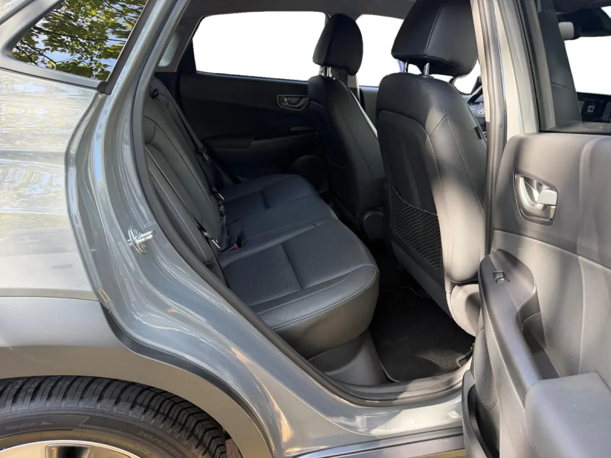 EV Premium 64 kWh HEAD UP DISPLAY | LEDEREN BEKLEDING | 455 KM ACTIERADIUS | ACC | DODEN HOEK DETECTIE | 12 MAANDEN BOVAG GARANTIE