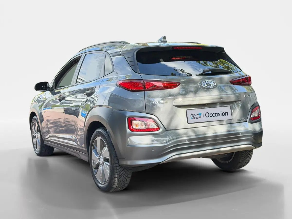 EV Premium 64 kWh HEAD UP DISPLAY | LEDEREN BEKLEDING | 455 KM ACTIERADIUS | ACC | DODEN HOEK DETECTIE | 12 MAANDEN BOVAG GARANTIE