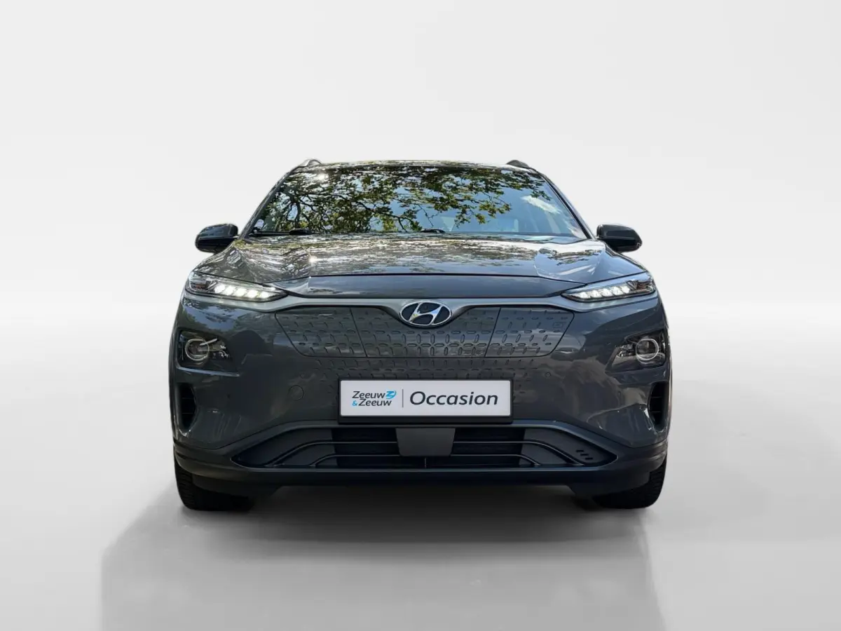 EV Premium 64 kWh HEAD UP DISPLAY | LEDEREN BEKLEDING | 455 KM ACTIERADIUS | ACC | DODEN HOEK DETECTIE | 12 MAANDEN BOVAG GARANTIE