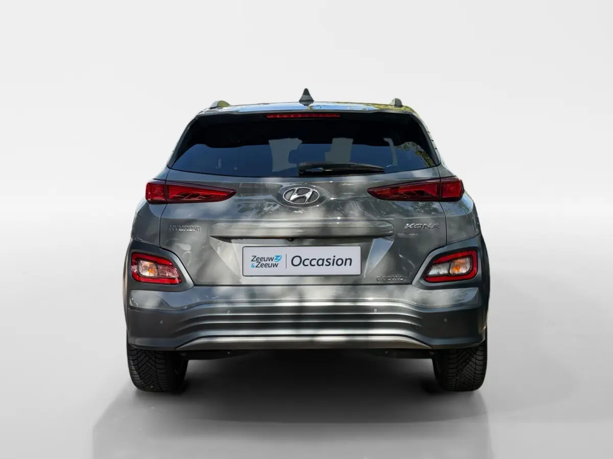 EV Premium 64 kWh HEAD UP DISPLAY | LEDEREN BEKLEDING | 455 KM ACTIERADIUS | ACC | DODEN HOEK DETECTIE | 12 MAANDEN BOVAG GARANTIE