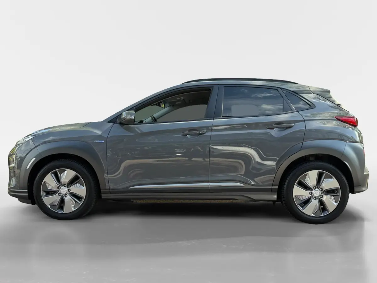 EV Premium 64 kWh HEAD UP DISPLAY | LEDEREN BEKLEDING | 455 KM ACTIERADIUS | ACC | DODEN HOEK DETECTIE | 12 MAANDEN BOVAG GARANTIE