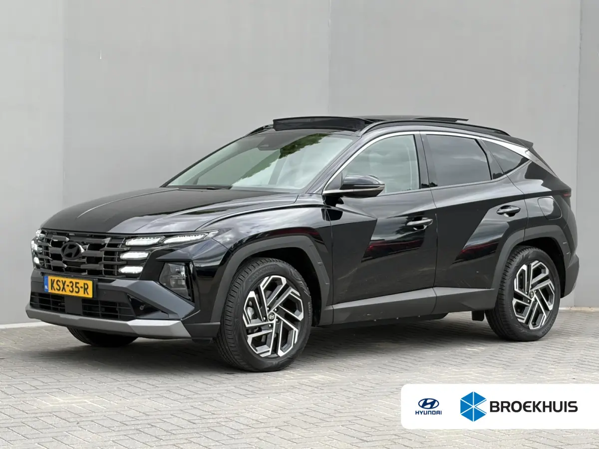 1.6 T-GDI PHEV Premium Sky 4WD /Accu SoH 100 % / Fabrieksgarantie tot 10-2029 / Panorama schuifdak / Dealer Onderhouden / HUD / Apple Carplay Android Auto / Camera / Elektr. stoelen & klep /