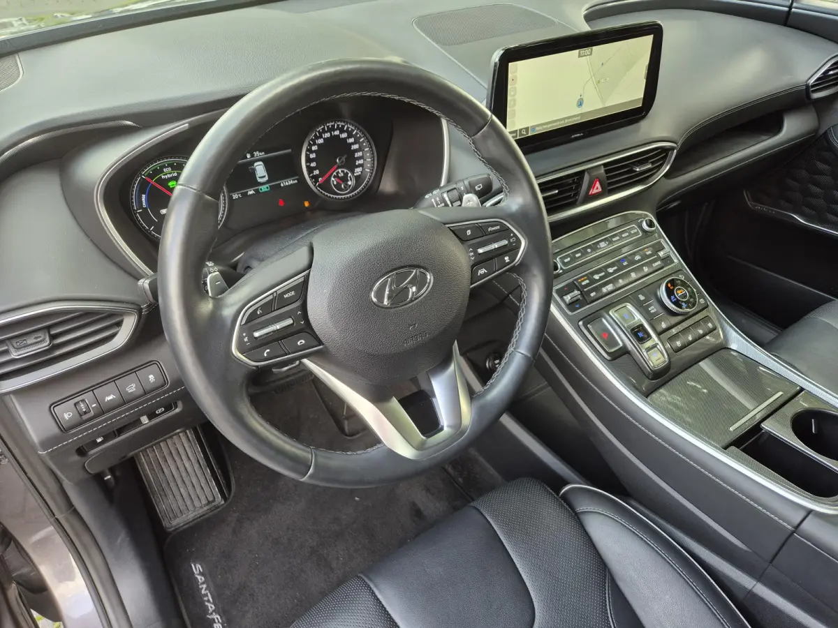 1.6 T-GDI PHEV Premium / AWD / Fabrieksgarantie tot 1/7/2027 / Dealer onderhouden  / EAER 58km / Apple Carplay Android Auto / Adaptief CC / Achteruitrijcamera / Stuur- Stoel en Achterbankver