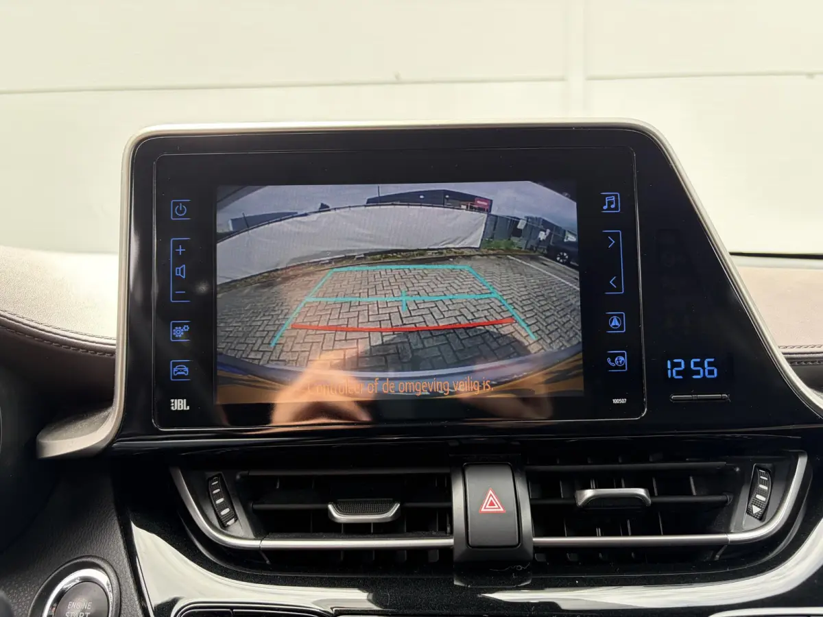 1.2 First Edition / Afn.Trekhaak (  1300 kg ) / Cruise control adaptief /  Navigatiesysteem / Leer /