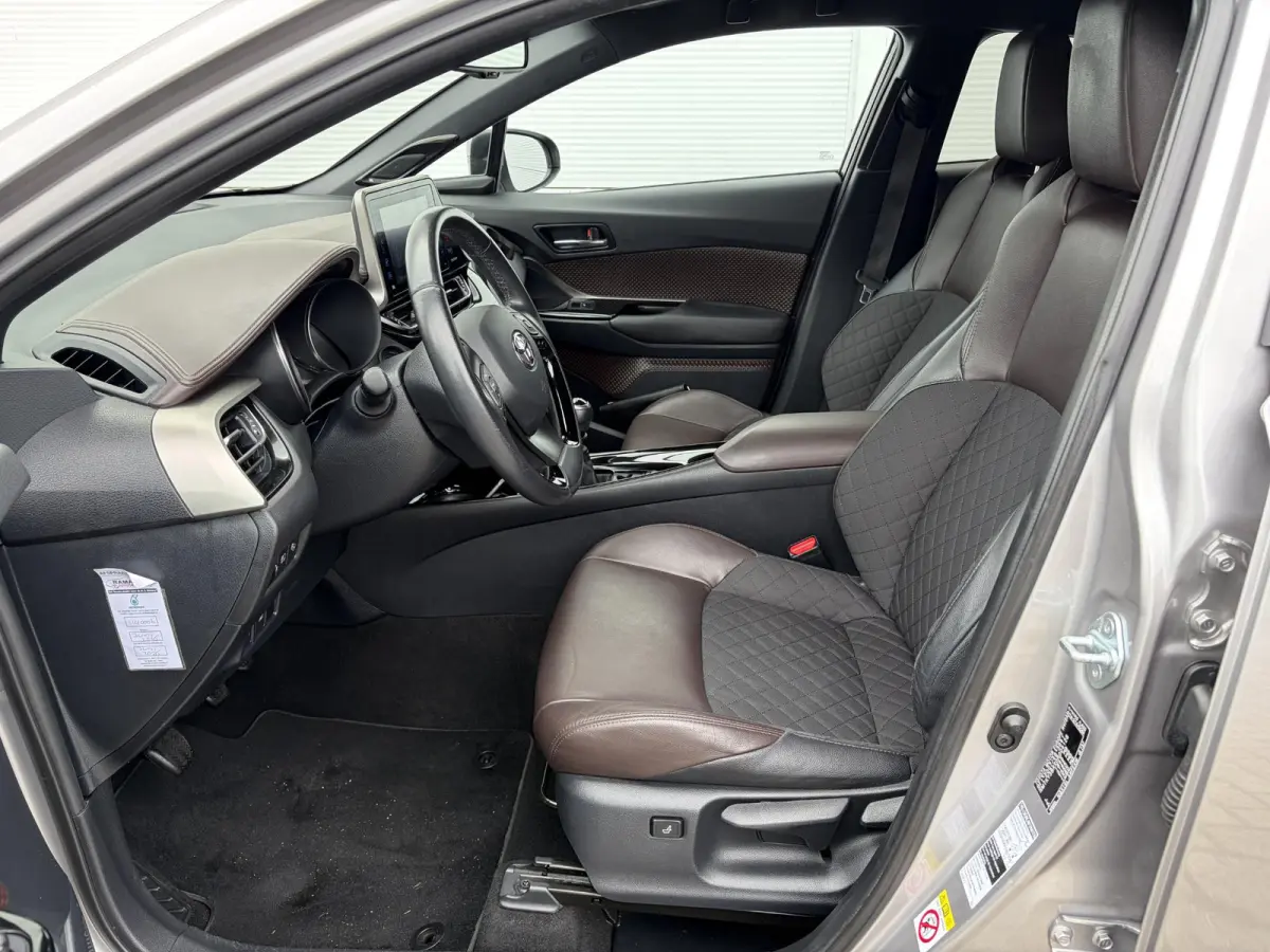 1.2 First Edition / Afn.Trekhaak (  1300 kg ) / Cruise control adaptief /  Navigatiesysteem / Leer /