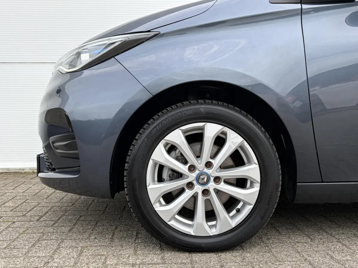 R110 Life 52 kWh / SOH 85% / Airco (automatisch) / Cruise control / Apple Carplay/Android Auto /
