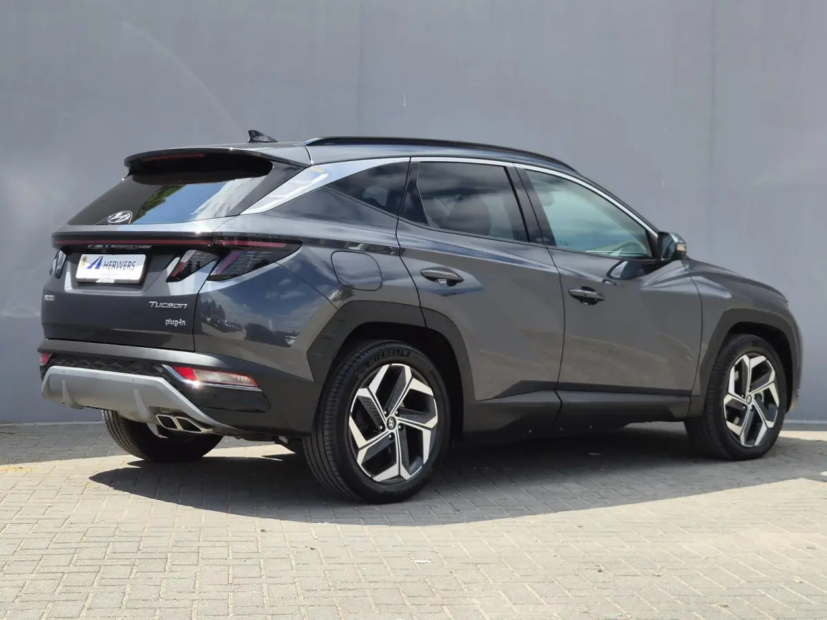 1.6 T-GDI PHEV Comfort Smart 4WD / Fabrieksgarantie tot 02-2029 / Dealer onderhouden / Glazen schuif- en kanteldak / Stuur- & Stoelverwarming / Trekgewicht 1350 kg / Achteruitrijcamera / App