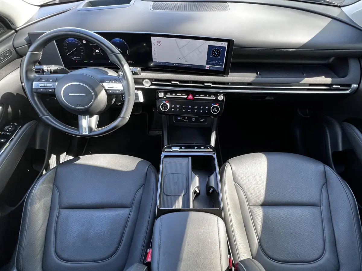 1.6 T-GDI HEV Premium / Facelift Nieuw model / Fabrieksgarantie tot 7-2029 / Dealer onderhouden / Navigatie / Stuur- en stoelverwarming / Elektrische klep / Adaptieve CC / 19"LM wielen /