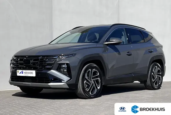 1.6 T-GDI HEV Premium / Facelift Nieuw model / Fabrieksgarantie tot 7-2029 / Dealer onderhouden / Navigatie / Stuur- en stoelverwarming / Elektrische klep / Adaptieve CC / 19"LM wielen /