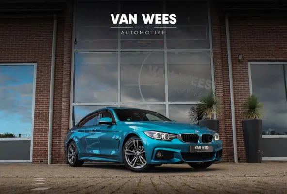 418i High Executive | M-sportpakket | Schuif-/kanteldak | Harman/kardon | Stoelverwarming | Cruise control | Navigatie Professional | Shadow Line | PDC