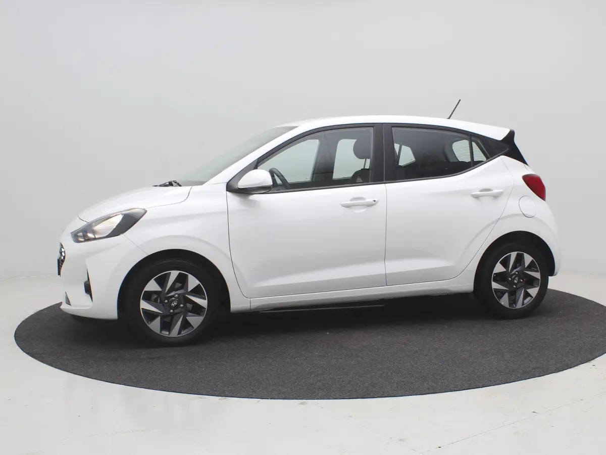 1.0 Comfort Smart 5-zits / Navigatie / Cruise Control / LMV / 5-Persoons / Airco / Stoelverwarming voor / Stuurwiel verwarming / Parkeersensoren achter / Achteruitrijcamera / Apple CarPlay &