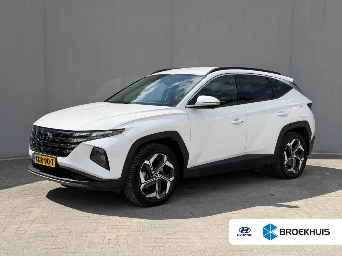 1.6 T-GDI PHEV Comfort Smart 4WD / Fabrieksgarantie tot 1-2028 / Volledig Onderhouden / Navigatie / Camera / PDC / DAB / Dodehoek Detectie / All Season Banden / Stoelverwarming /