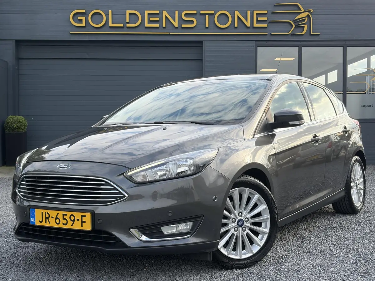 1.0 Titanium ✓125pk✓2e Eigenaar✓Navi✓Trekhaak✓6 Bak✓Clima✓Cruise✓Pdc V+A✓Net Beurt gehad✓17''Lm velgen✓N.A.P✓N.A.P✓Apk tot 09-2027