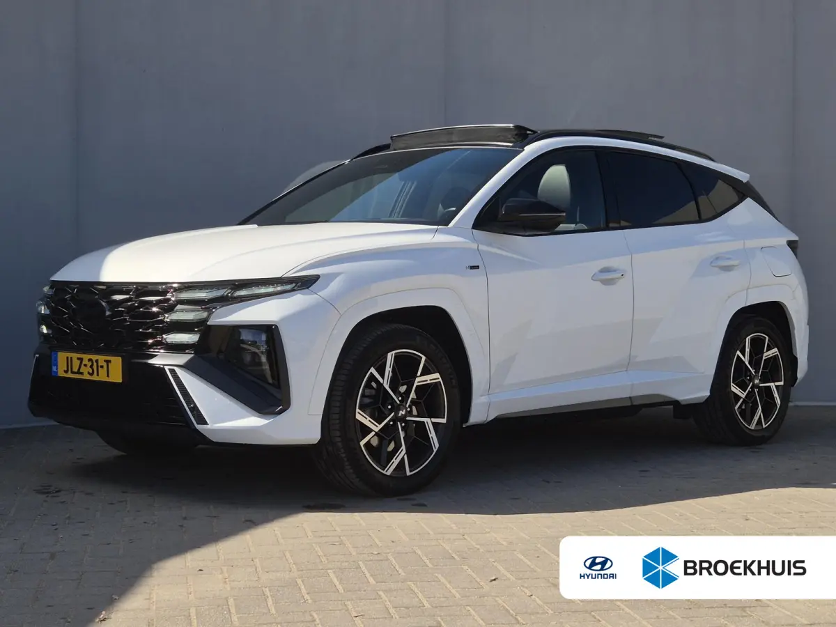 1.6 T-GDI PHEV N Line 4WD | Achteruitrijcamera | Apple Carplay/Android Auto | Lederen/suede bekleding/ Nieuw Model / Fabrieksgarantie tot 07-2029 / Dealer onderhouden / Trekgewicht 1210 kg /