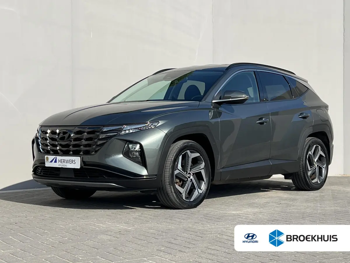 1.6 T-GDI PHEV Comfort Smart 4WD / 99% SOH / Fabrieksgarantie tot 04-2027 / WLTP 62km / Navi / Apple Carplay Android / Stuur- en stoelverwarming / Adapt. CC / 19" LM wielen /