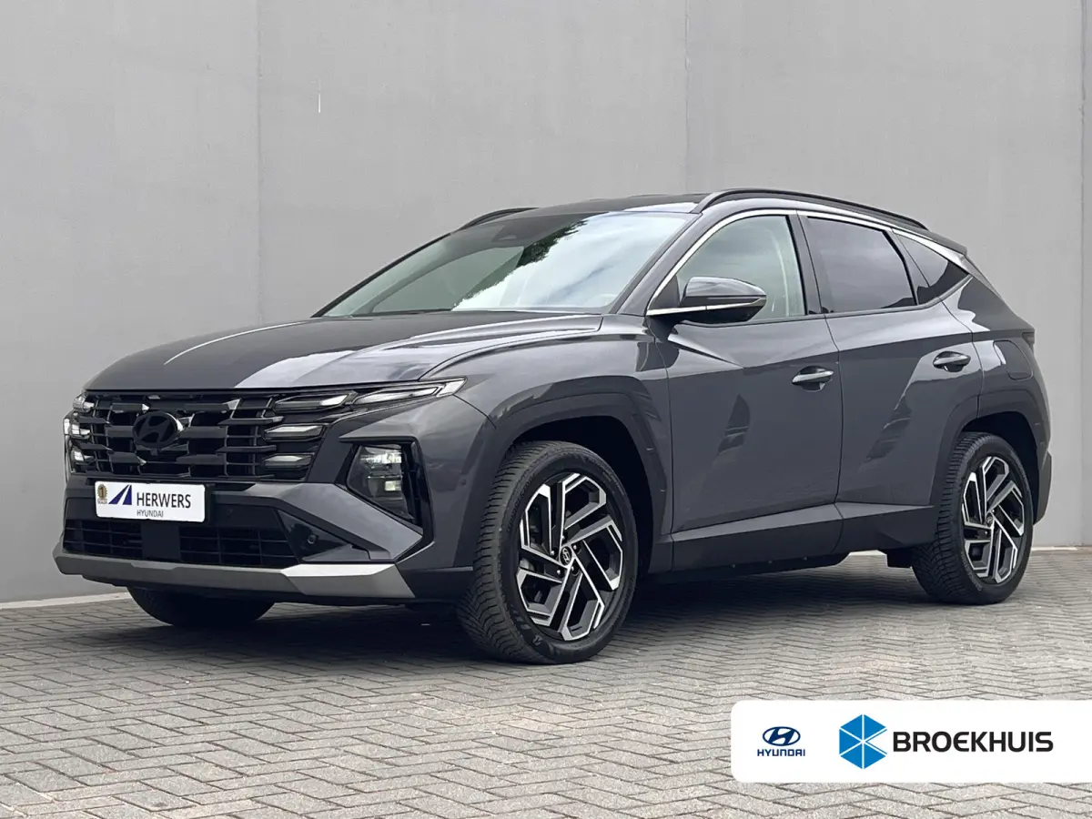 1.6 T-GDI PHEV Premium 4WD / Accu SoH 100 % / EAER 65 km / Leder / HUD / Navigatie / Apple Carplay Android / Stoelventilatie / Stuur-, stoel- & achterbankverwarming / 19" LM wielen & All Sea