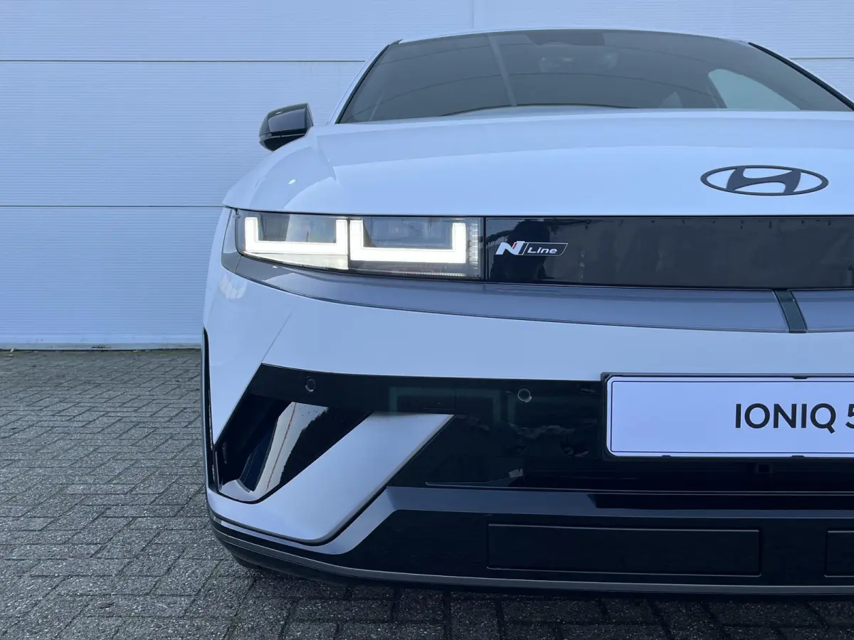 N Line Business 84 kWh / €2.000,- voordeel / Voorraad auto / Snel leverbaar / Navigatie / Apple Carplay/Android Auto / Stoel verwarming voor en achter / Adaptive Cruise Control /
