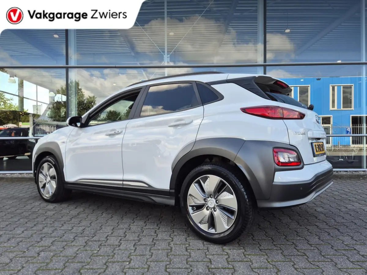 EV Premium 64 kWh|SOH 95% |Warmtepomp | Navi| Head Up|Stoel/Stuurwielverwaming