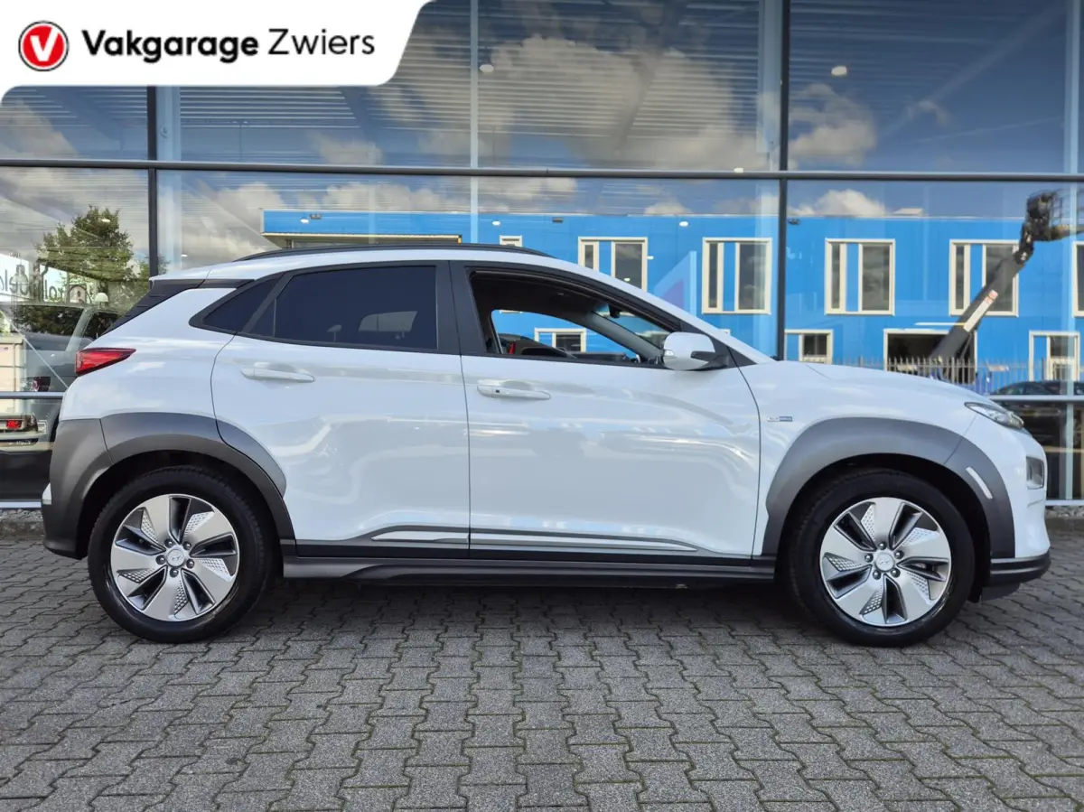 EV Premium 64 kWh|SOH 95% |Warmtepomp | Navi| Head Up|Stoel/Stuurwielverwaming