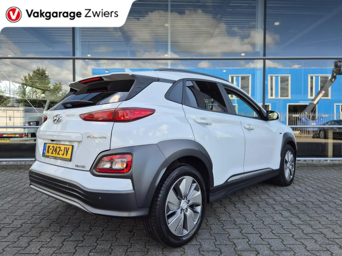 EV Premium 64 kWh|SOH 95% |Warmtepomp | Navi| Head Up|Stoel/Stuurwielverwaming