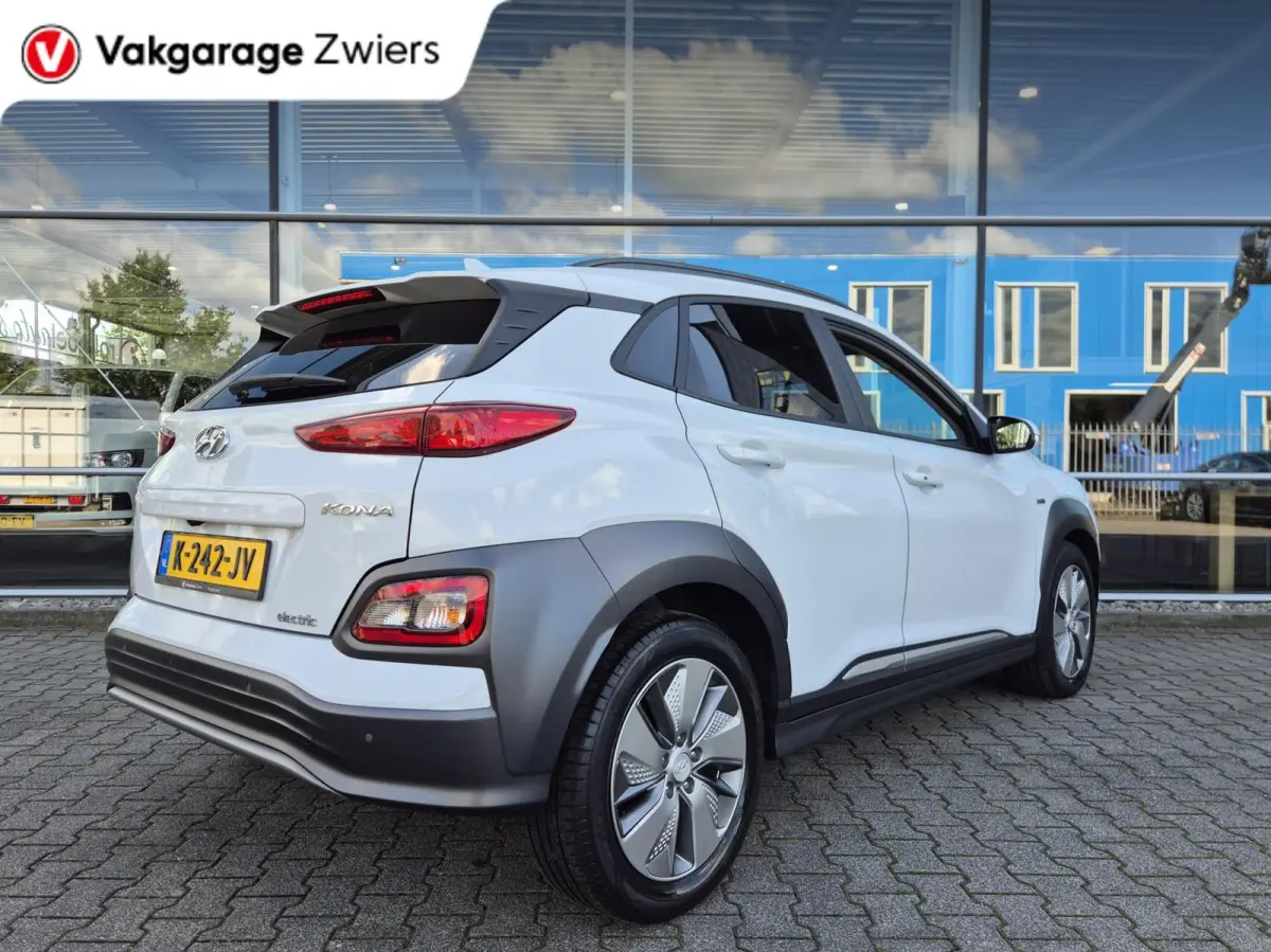 EV Premium 64 kWh|SOH 95% |Warmtepomp | Navi| Head Up|Stoel/Stuurwielverwaming