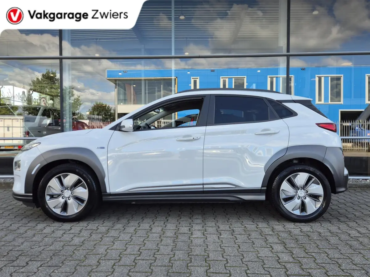 EV Premium 64 kWh|SOH 95% |Warmtepomp | Navi| Head Up|Stoel/Stuurwielverwaming