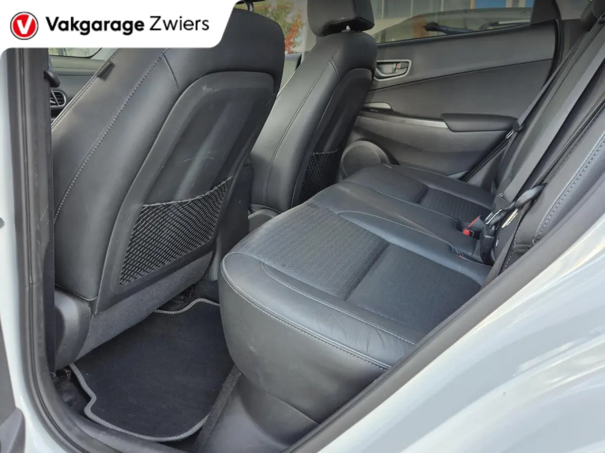 EV Premium 64 kWh|SOH 95% |Warmtepomp | Navi| Head Up|Stoel/Stuurwielverwaming