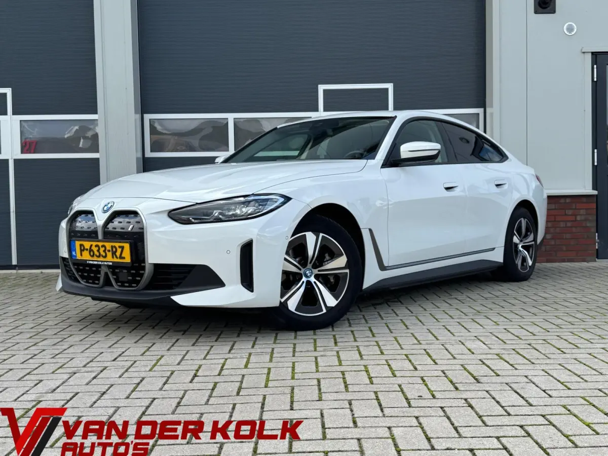 eDrive40 High Executive 84 kWh | half Leder | Camera | Full LED | CarPlay | DAB+ | Cruise | Climate | Navigatie