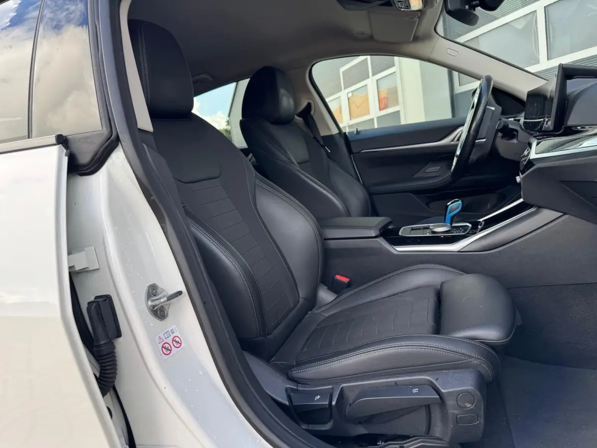 eDrive40 High Executive 84 kWh | half Leder | Camera | Full LED | CarPlay | DAB+ | Cruise | Climate | Navigatie