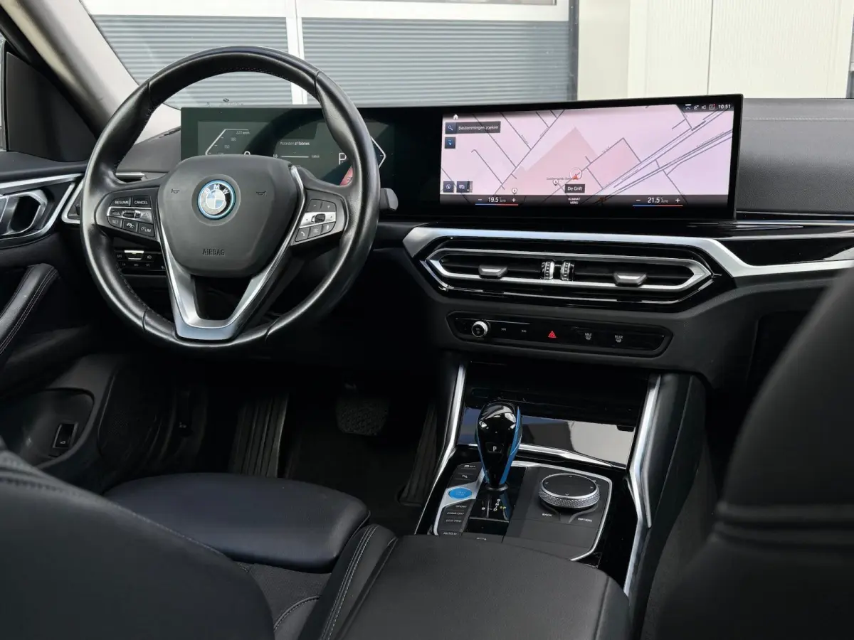 eDrive40 High Executive 84 kWh | half Leder | Camera | Full LED | CarPlay | DAB+ | Cruise | Climate | Navigatie