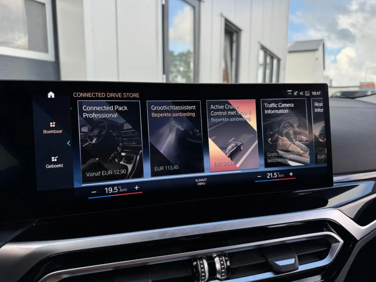 eDrive40 High Executive 84 kWh | half Leder | Camera | Full LED | CarPlay | DAB+ | Cruise | Climate | Navigatie