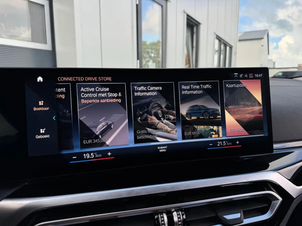 eDrive40 High Executive 84 kWh | half Leder | Camera | Full LED | CarPlay | DAB+ | Cruise | Climate | Navigatie