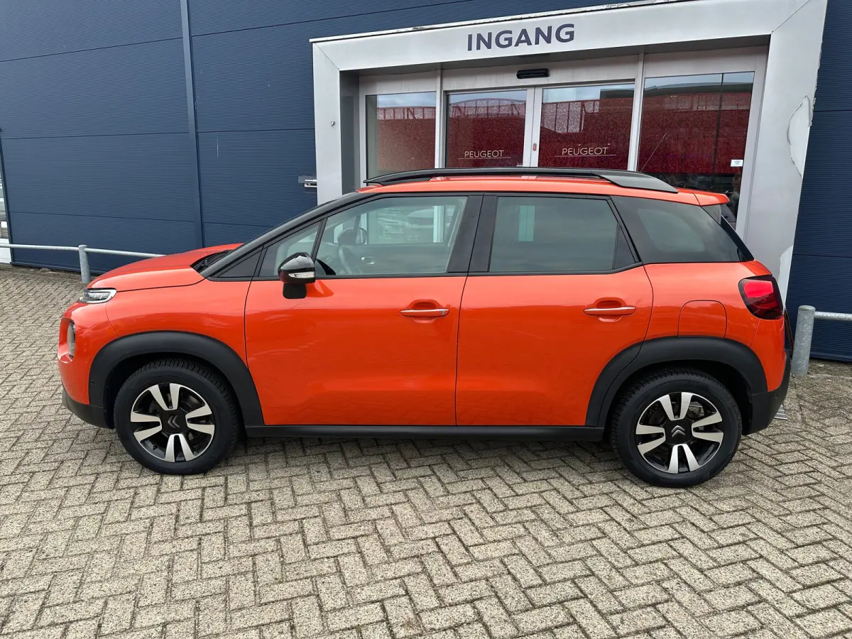 1.2 PureTech S&S Shine | Trekhaak | Camera | Carplay | Navigatie | Climate Control | Parkeersensoren | Achterbank in delen neerklapbaar | Achteruitrijcamera | Afneembare trekhaak