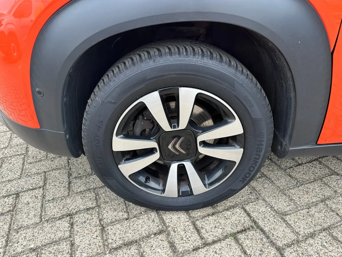 1.2 PureTech S&S Shine | Trekhaak | Camera | Carplay | Navigatie | Climate Control | Parkeersensoren | Achterbank in delen neerklapbaar | Achteruitrijcamera | Afneembare trekhaak